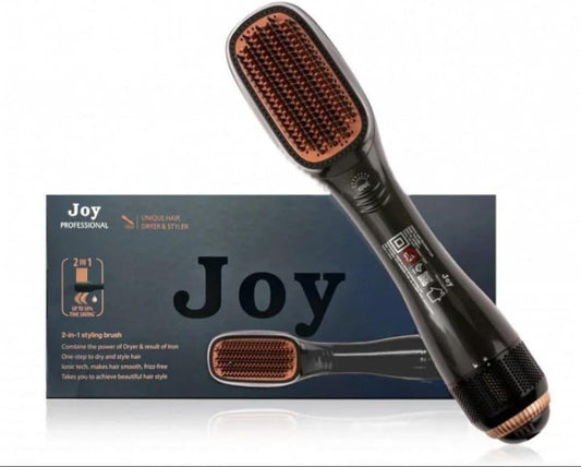 Hair styling brush with 'Joy' branding on a white background